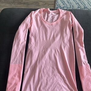 Pink lululemon pink coral long sleeve athletic workout top, size 4